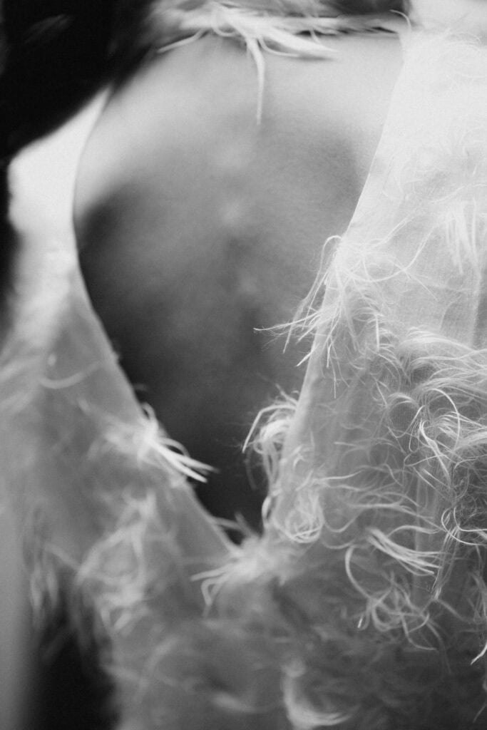Silhouette of a woman's waist with a torn and transparent fabric for theatre of real life.